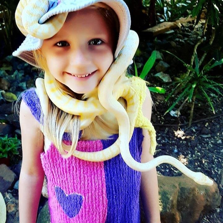 "My 6-year-old girl who loves slithery reptiles with a passion and thought this python encounter was the best thing ever!"