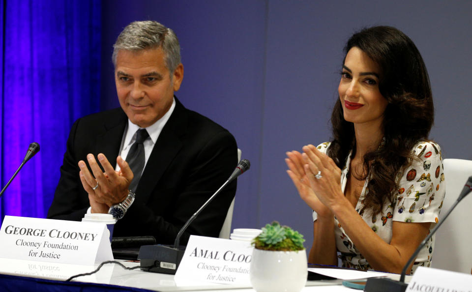 Actor George Clooney and his wife Amal attend a CEO roundtable at the United Nations during the United Nations General Assembly in New York September 20, 2016. REUTERS/Kevin Lamarque 