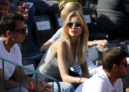 Ester Satorova, the girlfriend of Tomas Berdych of Czech Republic, watches his men's singles match against compatriot Radek Stepanek at the French Open tennis tournament at the Roland Garros stadium in Paris, France, May 27, 2015. REUTERS/Pascal Rossignol
