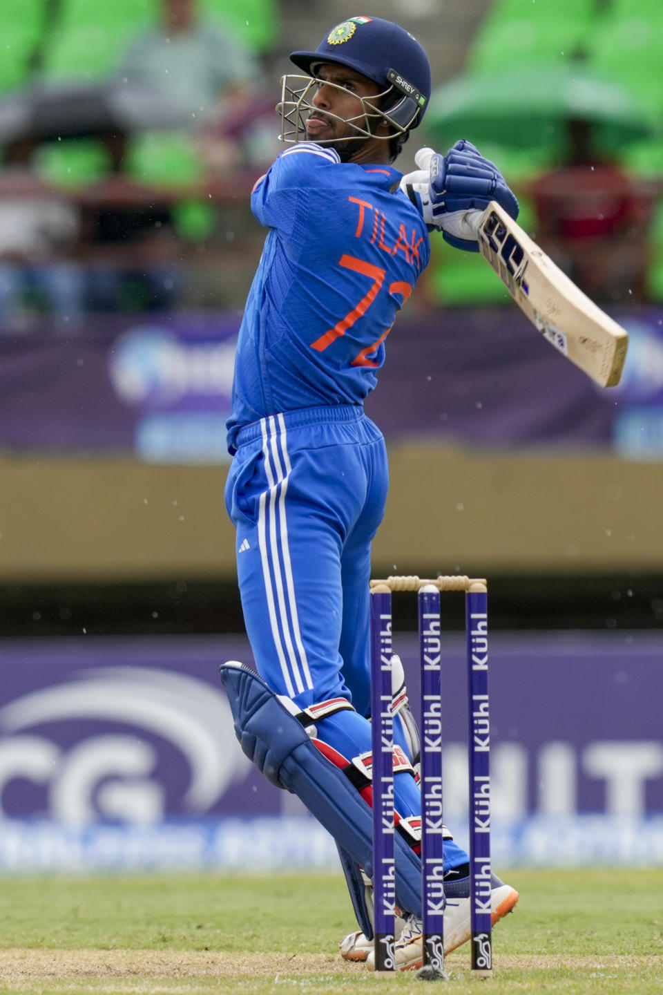 India's Tilak Varma plays a shot for 4 runs against West Indies during the third T20 cricket match at Providence Stadium in Georgetown, Trinidad and Tobago, Tuesday, Aug. 8, 2023. (AP Photo/Ramon Espinosa)