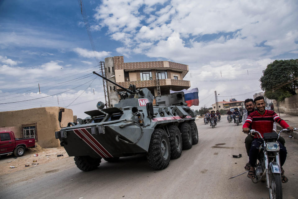 Russian military patrols near Syrian and Turkish border in north Syria, Friday. Oct. 25, 2019. (AP Photo/Baderkhan Ahmad)