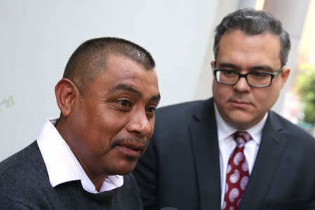 Mario Vargas-Lopez, 45, (L) is interviewed outside immigration court with his lawyer Alex Galvez in Los Angeles, California, U.S., March 22, 2017. REUTERS/Lucy Nicholson