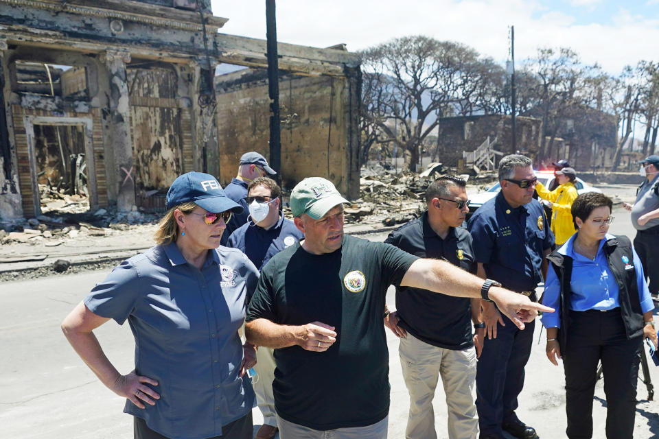 FEMA Administrator Deanne Criswell and Hawaii'sGovernor Josh Green during a tour of wildfire damage on Aug. 12, 2023, in Lahaina, Hawaii.  (Rick Bowmer / AP)