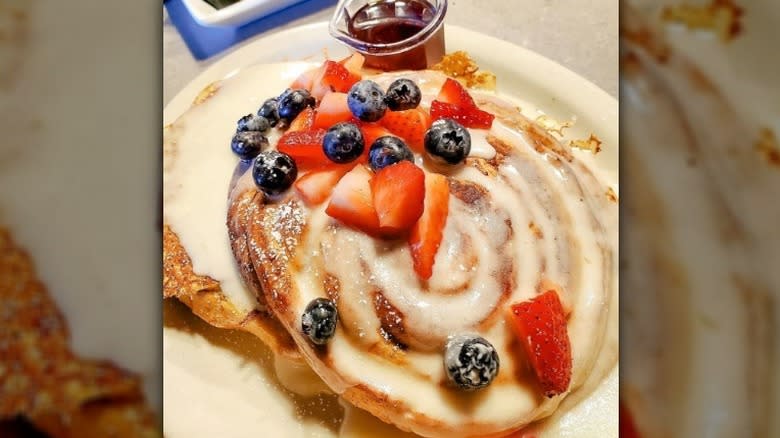 Cinnamon roll French toast topped with fruit