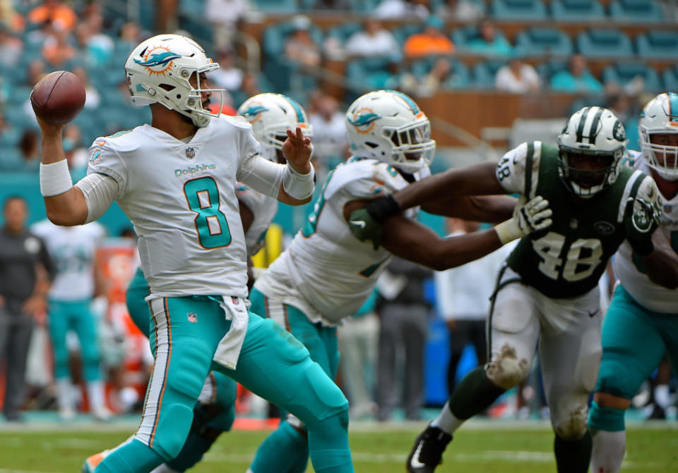 Oct 22, 2017; Miami Gardens, FL, USA; Miami Dolphins quarterback Matt Moore (8) attention attempts a pass against the New York Jets during the second half at Hard Rock Stadium. Mandatory Credit: Jasen Vinlove-USA TODAY Sports