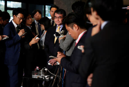 Japanese Foreign Minister Taro Kono speaks to media after a meeting with South Korean ambassador to Japan Lee Su-hoon (not pictured) at the Foreign Ministry in Tokyo, Japan October 30, 2018. REUTERS/Issei Kato