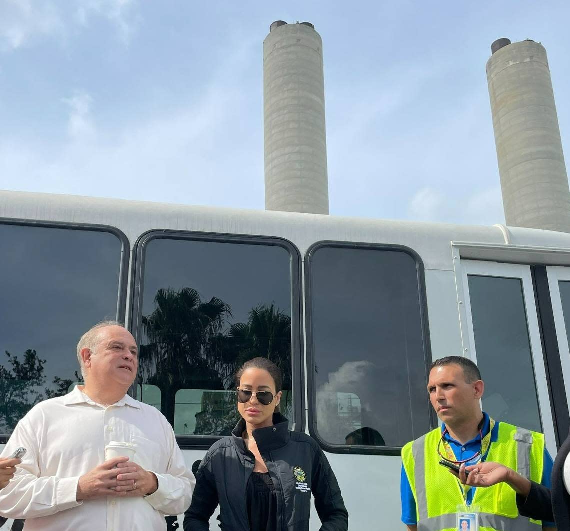 From left to right: Juan Carlos Bermudez and Danielle Cohen Higgins, two Miami-Dade commissioners, and Mike Fernandez, director of the county’s Solid Waste Management Department, gather outside the shuttered Covanta trash incinerator plant on Wednesday, May 31, 2023. Fernandez resigned his post on July 3, 2023, effective on July 14.
