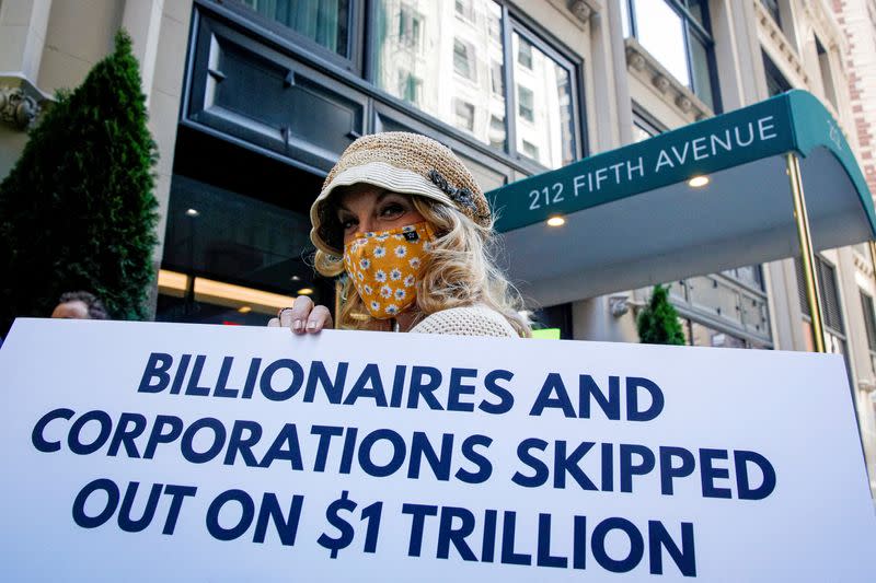FILE PHOTO: Members of the Patriotic Millionaires hold a federal tax filing day protest in New York