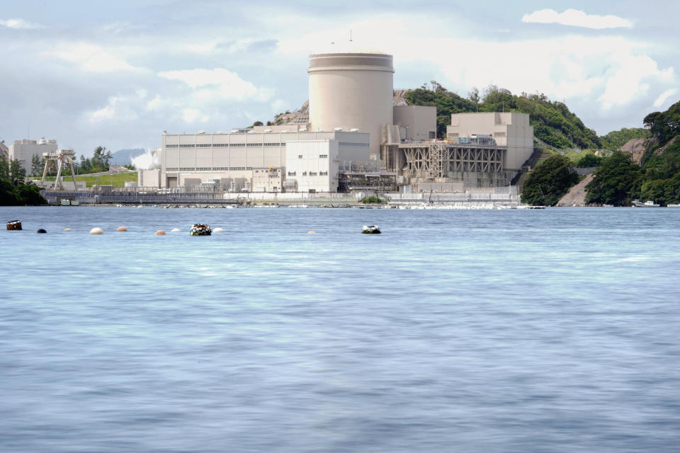 The No. 3 reactor of the Mihama Nuclear Power Plant operated by Kansai Electric Power Co. is seen in Mihama town, Fukui prefecture, central Japan, Wednesday, June 23, 2021. The more than 40-year-old nuclear reactor which suffered a deadly accident resumed operation Wednesday after being taken offline for a decade after the March 2011 Fukushima nuclear disaster, as Japan pushes to meet its carbon emissions reduction goal. (Kyodo News via AP)