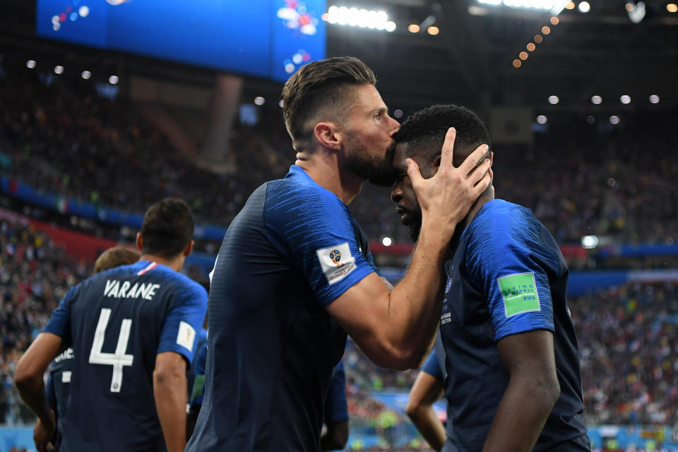 Samuel Umtiti gets a kiss from Olivier Giroud after breaking the deadlock.