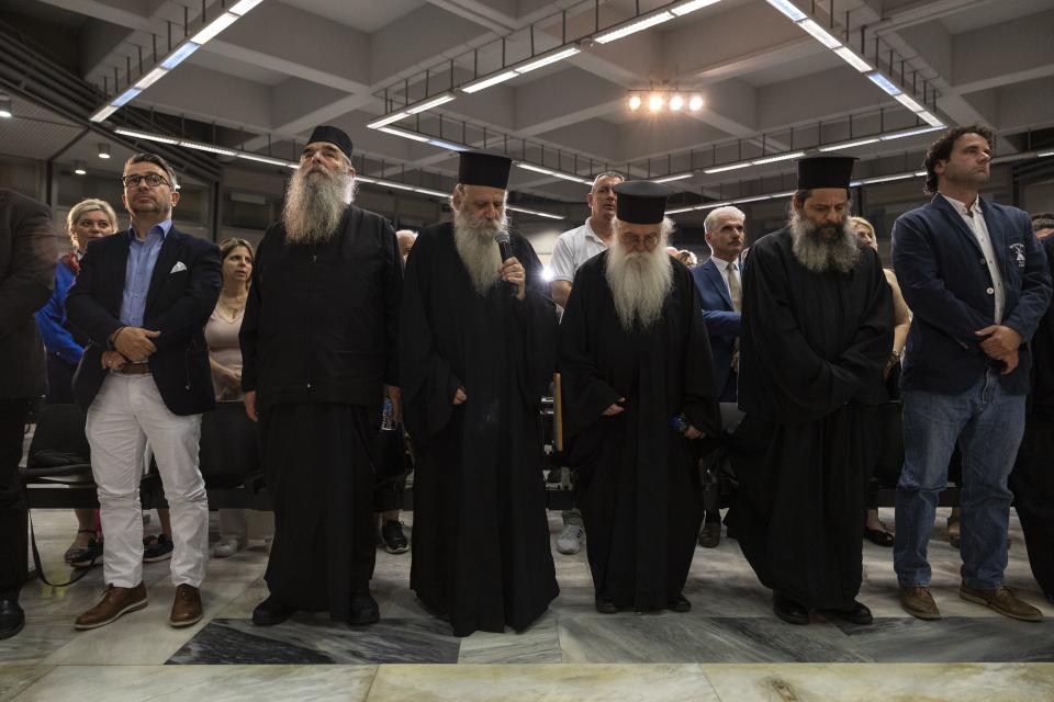 Greek Orthodox priests attend an election rally of Niki party, in Athens, Greece, Thursday, June 22, 2023. Three far-right and two far-left, could conceivably cross the 3% parliamentary entry threshold in Sunday's elections, despite a swing back to mainstream politicians as the scars of Greece's 10-year financial crisis gradually heal. (AP Photo/Yorgos Karahalis)