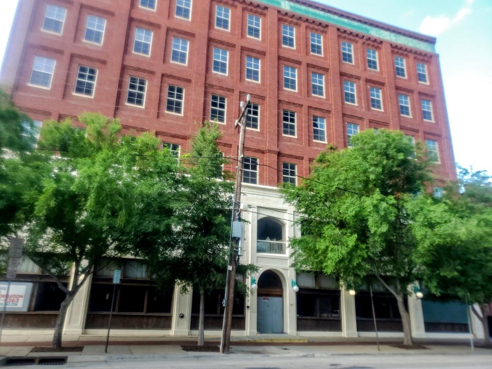 The former Spaghetti Warehouse is one of three buildings in Bricktown that have owners who have left them boarded up with no plans for redevelopment. Steve Lackmeyer