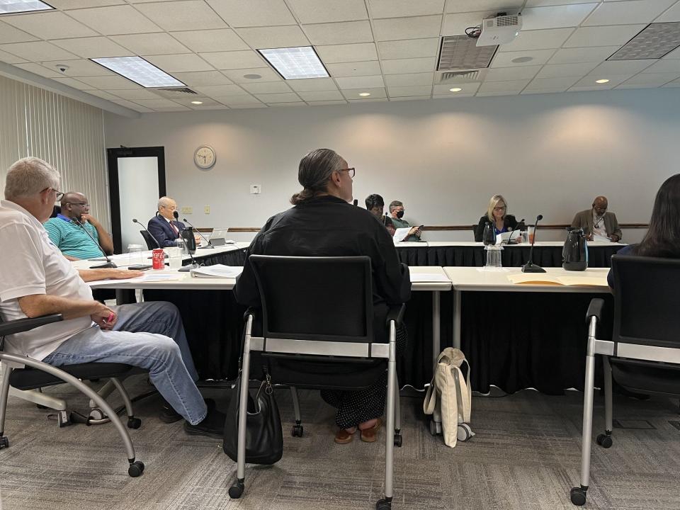 Daytona Beach city commissioners huddled for a budget workshop last month at City Hall. The new budget year begins Oct. 1.