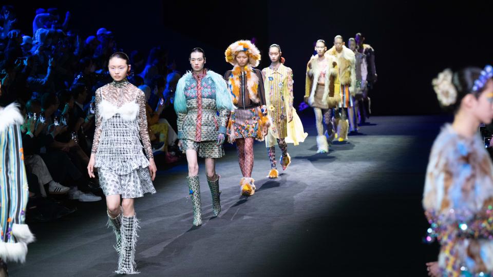 Models take part in brand Shuting Qiu show during fall 2023 Shanghai Fashion Week.
