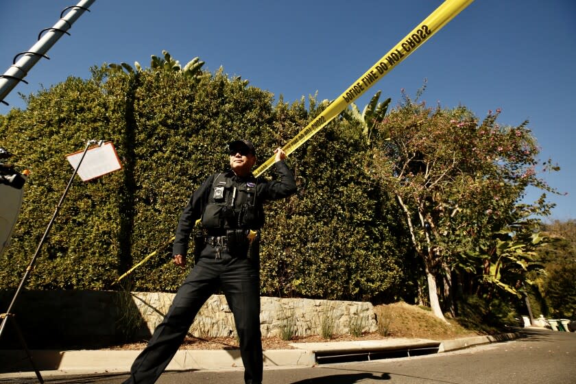 BEVERLY HILLS CA DECEMBER 1, 2021 - Police have cordoned off the area near the Beverly Hills home of music producer Clarence and Jacqueline Avant. Jacqueline Avant was reportedly shot and killed during a home invasion early Wednesday morning, Dec. 1, 2021. (Al Seib / Los Angeles Times)