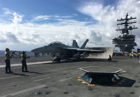 The aircraft carrier USS Ronald Reagan conducts joint drills with the South Korean navy at sea October 19, 2017. REUTERS/Tim Kelly