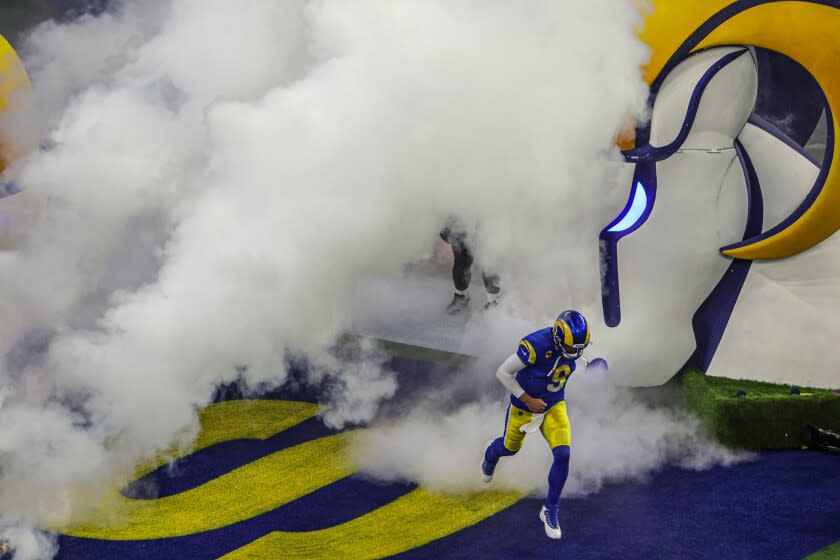 Inglewood, CA, Monday, January 17, 2022 - Los Angeles Rams quarterback Matthew Stafford (9) runs on to the field to play the Arizona Cardinals in the NFC divisional playoff game at SoFi Stadium. (Robert Gauthier/Los Angeles Times)