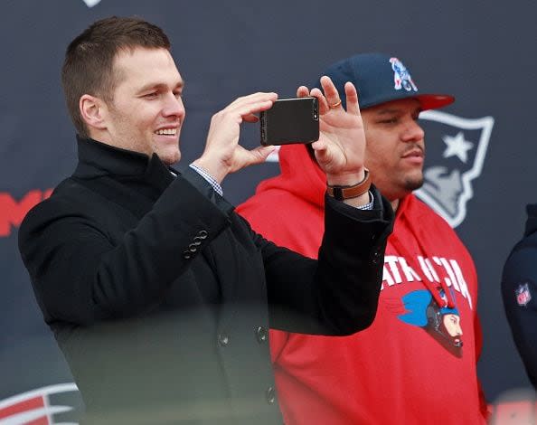 (Foxboro, MA, 01/30/17) Patriots QB Tom Brady uses his phone to record screaming fans during a rally at Gillette Stadium before the team travels to Houston for the Super Bowl on Monday, January 30, 2017  Staff photo by Matt Stone (Photo by Matt Stone/MediaNews Group/Boston Herald via Getty Images)