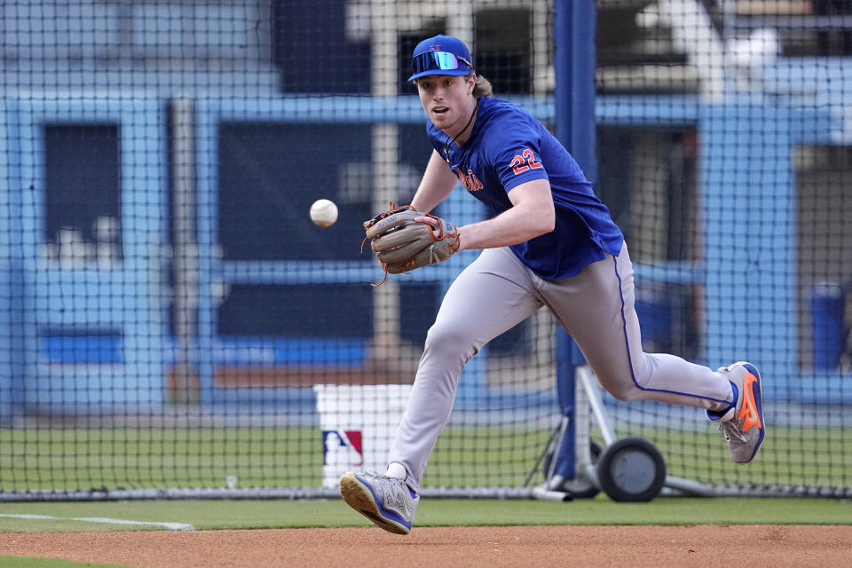 New York Mets' Brett Baty fields a ball during practice prior to a baseball game against the Los Angeles Dodgers Monday, April 17, 2023, in Los Angeles. (AP Photo/Mark J. Terrill)