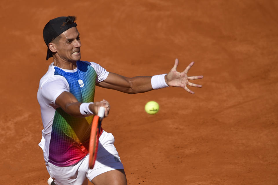 Federico Coria, of Argentina returns the ball to Facundo Diaz Acosta, of Argentina, during an Argentina Open ATP semifinal tennis match, at the Guillermo Vilas Stadium, in Buenos Aires, Argentina, Saturday, Feb. 17, 2024. (AP Photo/Gustavo Garello)