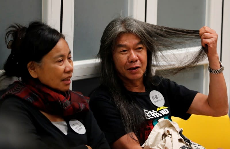 Local candidate Leung Kwok-hung reacts during the counting of the votes of the Hong Kong council elections