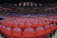 T-shirts cover empty seats before Game 7 of an opening-round NBA basketball playoff series between the Los Angeles Clippers and the Golden State Warriors, Saturday, May 3, 2014, in Los Angeles. (AP Photo/Mark J. Terrill)