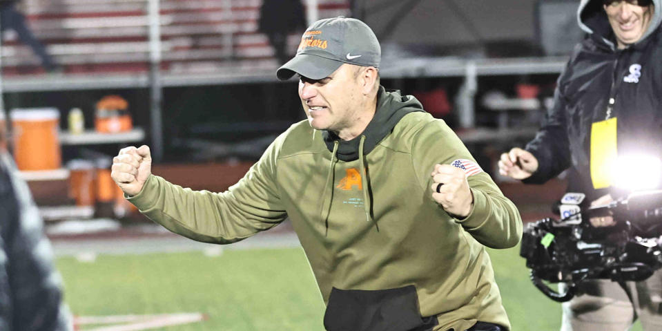Anderson head coach Evan Dreyer celebrates after beating Withrow 49-28 in the regional final, Nov. 17, 2023.