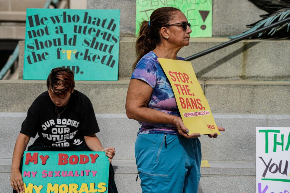 Abortion-rights supporters protest in front of the Indiana Statehouse during a special session Monday, July 25, 2022, at the Indiana Statehouse in Indianapolis. 