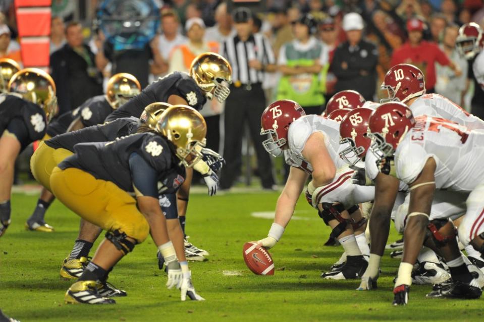 Jan 7, 2013; Miami, FL, USA; Alabama Crimson Tide offensive linesman Barrett Jones (75) prepares to snap the ball at the line of scrimmage against the Notre Dame Fighting Irish during the second half of the 2013 BCS Championship game at Sun Life Stadium. Mandatory Credit: Matt Cashore-USA TODAY Sports