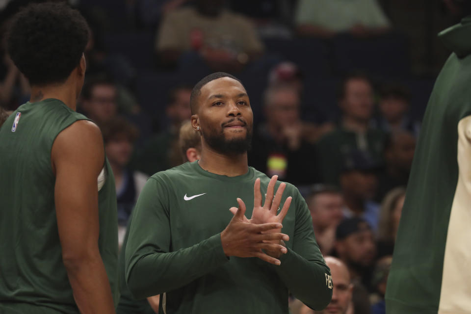 Milwaukee Bucks guard Damian Lillard (0) in the second half of an NBA basketball game Tuesday, Oct. 10, 2023, in Memphis, Tenn. (AP Photo/Nikki Boertman)