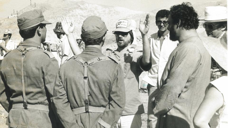 Tarek Ben Ammar (back right), on set with Steven Spielberg on 'Raiders of the Lost Ark'