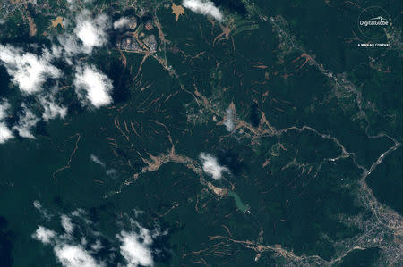 A satellite image of "after the floods" damage northwest of Yasuura, Japan, captured July 10, 2018. Satellite image 2018 DigitalGlobe, a Maxar company/Handout via REUTERS