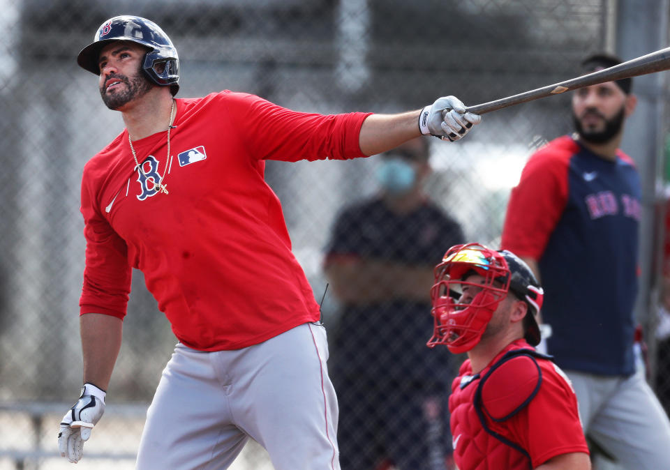 FORT MYERS - FEBRUARY 27: The Red Sox's J.D. Martinez watches the flight of a ball he has hit high and deep to left field off of Eduardo Rodriguez (not pictured) during a simulated game. The ball just missed going over the high fence on Field No. 1. and Martinez indicted from second base to Rodriguez how close it had come to going out of the yard. The Red Sox continued Spring Training workouts at the Jet Blue Complex in Fort Myers, FL on Feb. 27, 2021. (Photo by Jim Davis/The Boston Globe via Getty Images)