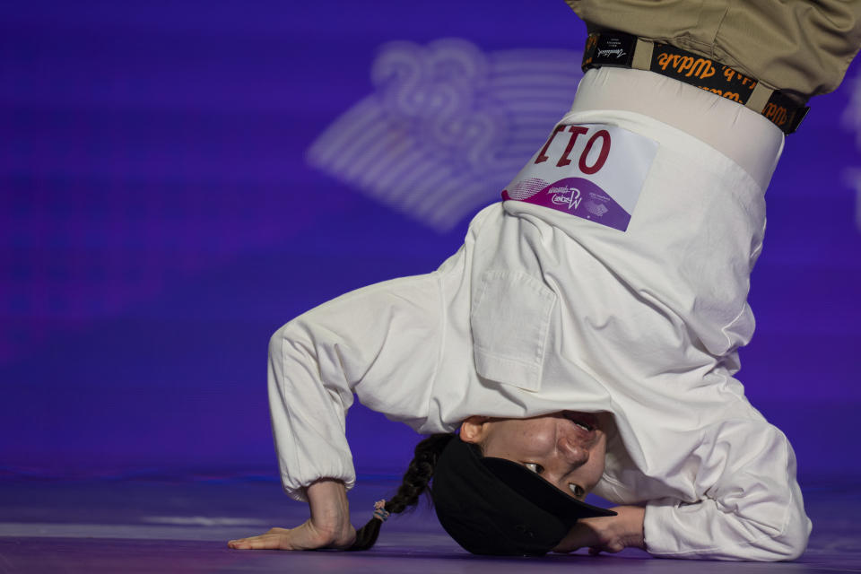 CORRECTS NAME - Mongolia's Khandjav Myagmarjav competes during the women's pre-selection for breaking at the 19th Asian Games in Hangzhou, China, Friday, Oct. 6, 2023. (AP Photo/Louise Delmotte)