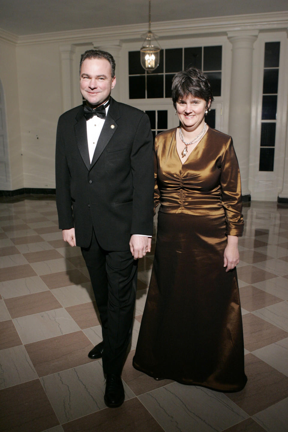 <p>Virginia Gov. Tim Kaine arrives at the White House with his wife, Anne Holton, at the annual state dinner for the nation’s governors, Feb. 26, 2006. (Photo: Manuel Balce Ceneta/AP)</p>