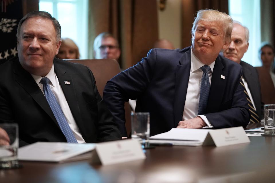 WASHINGTON, DC - JULY 16: U.S. President Donald Trump listens to a presentation about prescription drugs during a cabinet meeting with Secretary of State Mike Pompeo (L), acting Defense Secretary Richard Spencer and others at the White House July 16, 2019 in Washington, DC. Trump and members of his administration addressed a wide variety of subjects, including Iran, opportunity zones, drug prices, HIV/AIDS, immigration and other subjects for more than an hour. (Photo by Chip Somodevilla/Getty Images) ORG XMIT: 775374453 ORIG FILE ID: 1162404480