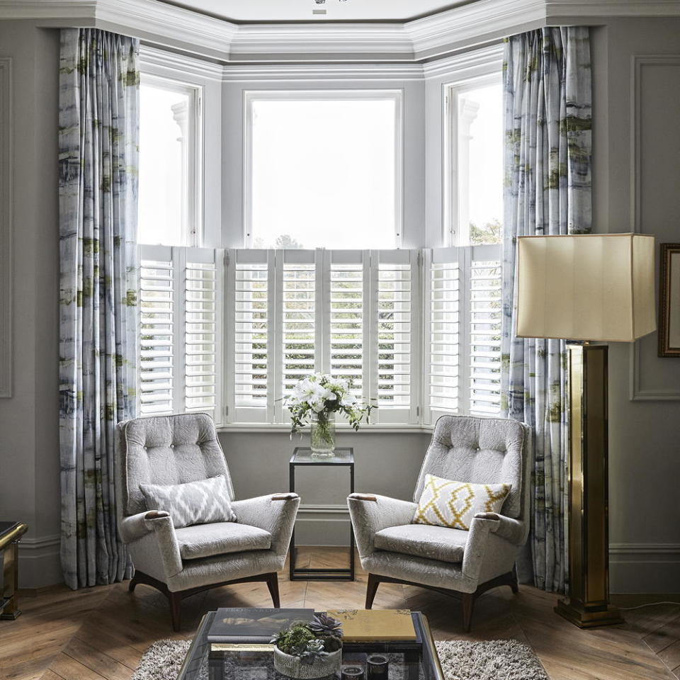 <p> In rooms where you choose a window treatment based on practicality, such as shutters on the lower half of a living room window to offer privacy, it's best to choose a timeless white design. </p> <p> To add the colour and decoration you can frame the window with curtains that are there more to add decoration – you might not ever need to draw them, but they become essential to soften the look and add pattern or colour to your decorating scheme. </p>