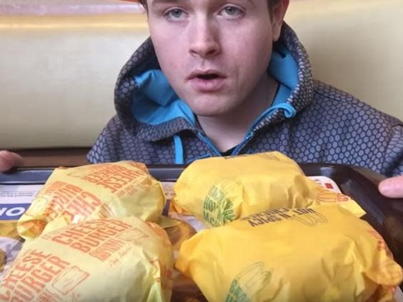 Cleary pictured during a review of a McDonald’s meal uploaded to his YouTube channel on 19 January – the same day he was arrested (Christopher Cleary/YouTube)