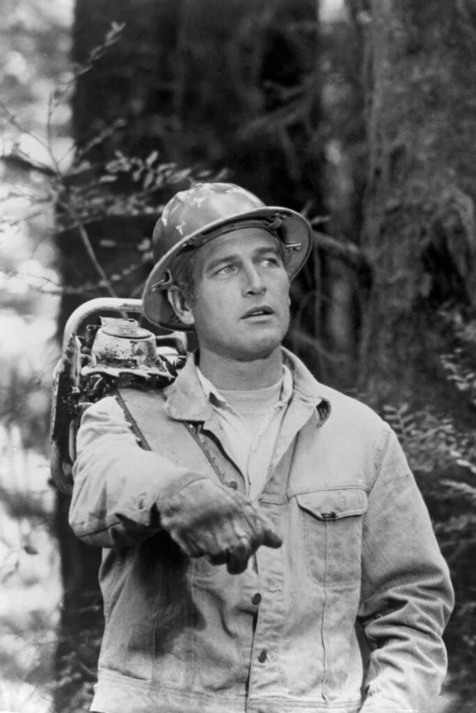 “I was afraid he’d get killed if he tried to catch up with me.” Paul Newman shooting <em>Sometimes a Great Notion</em>. (Credit: Michael Ochs Archives/Getty Images)