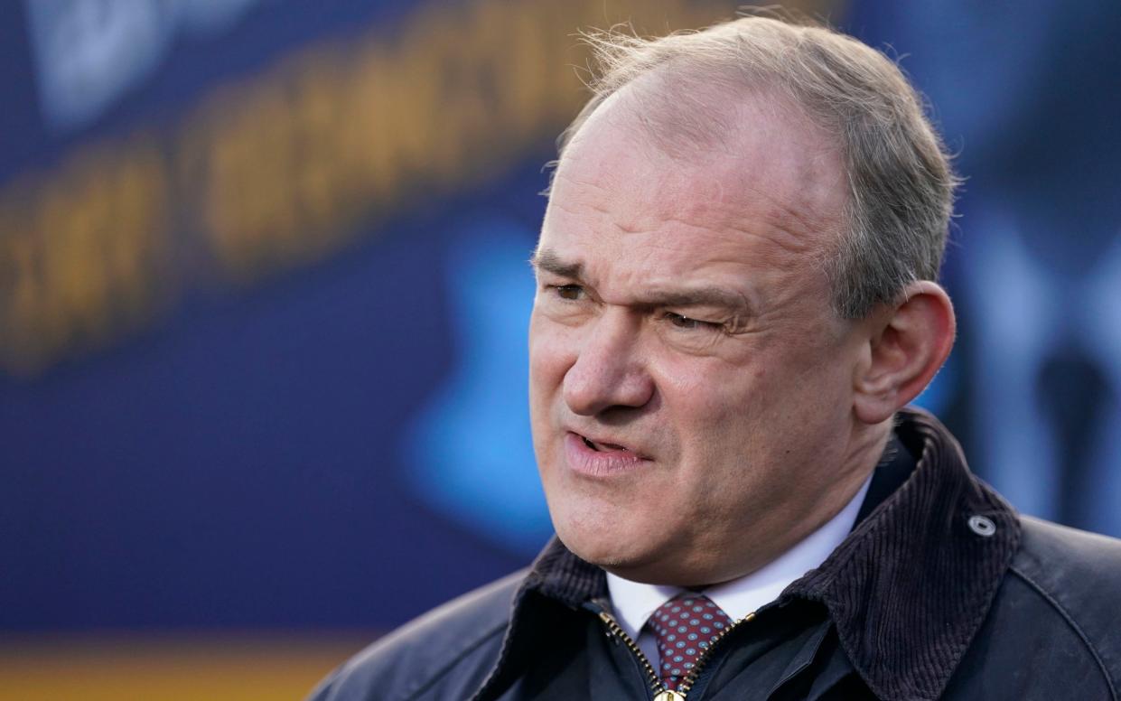 Liberal Democrat leader Sir Ed Davey speaks with members of the media during a rally in Guildford