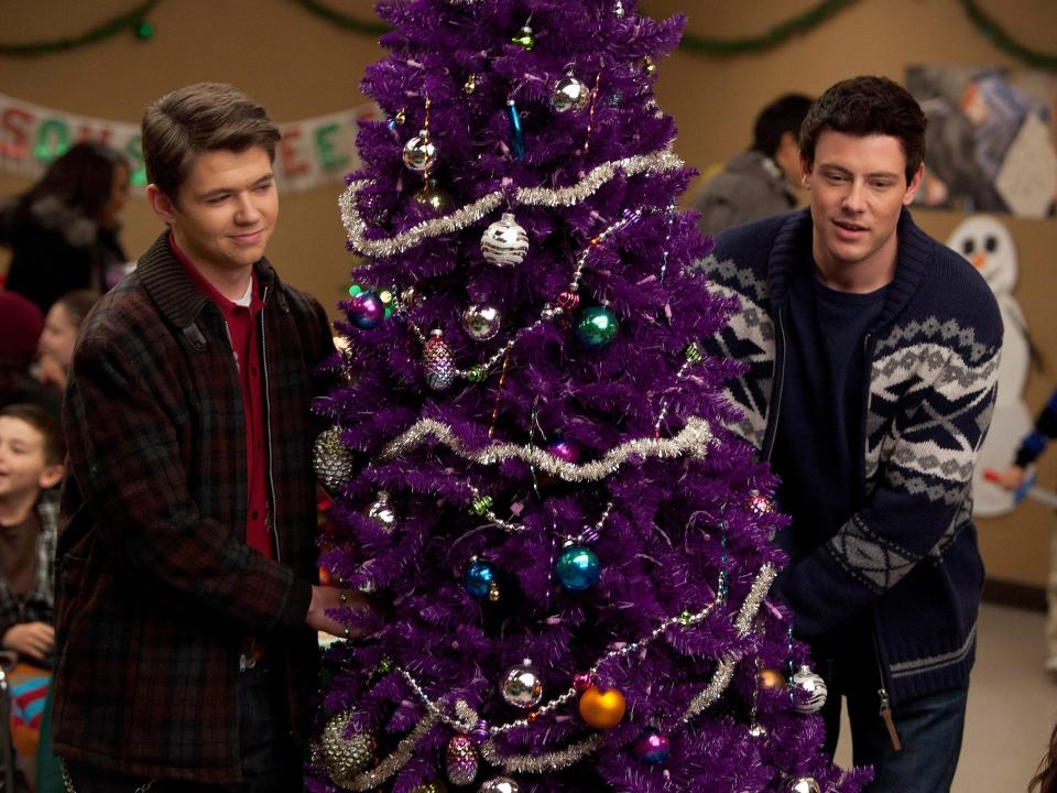 Damian McGinty and Cory Monteith with a christmas tree on "Glee"