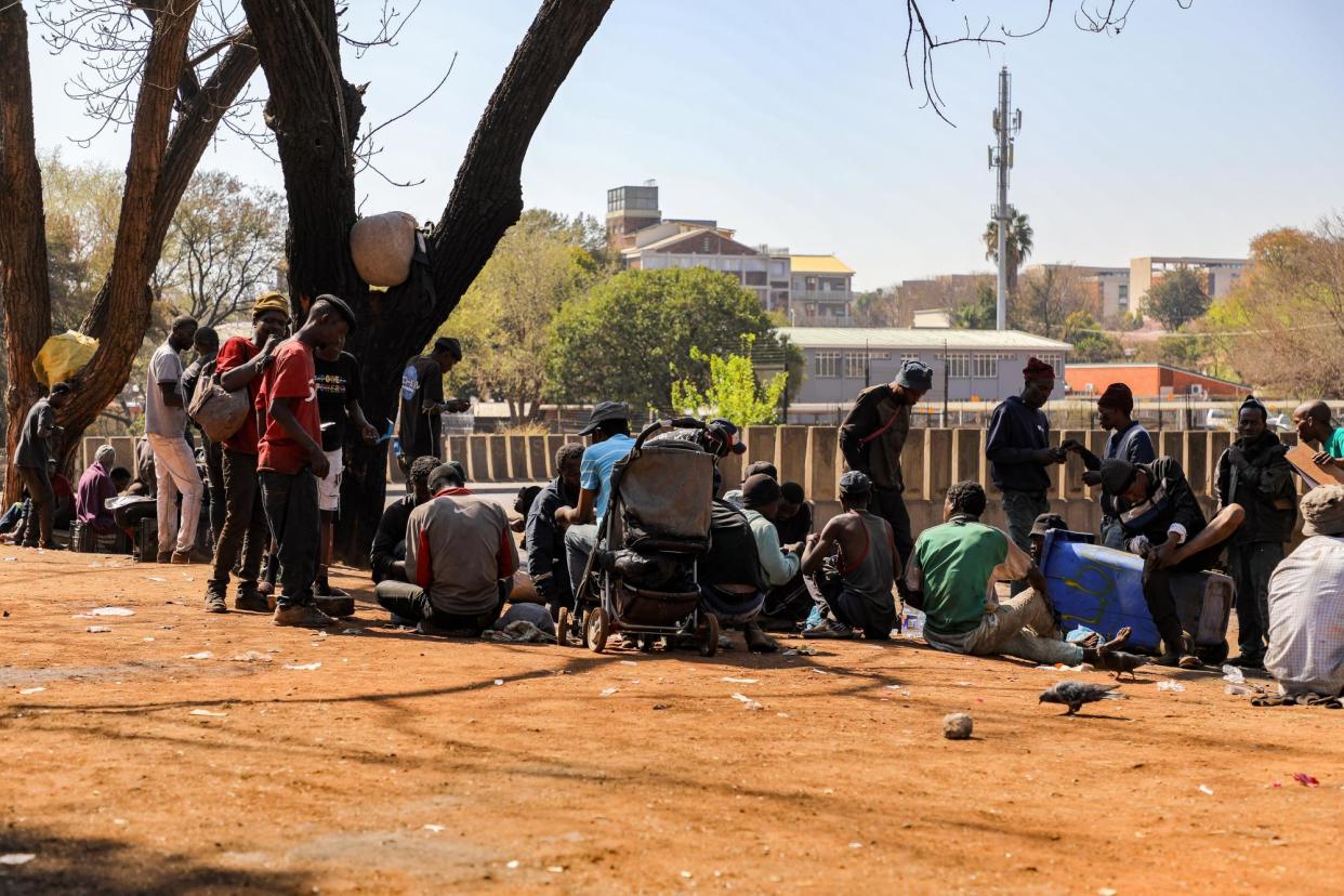 <span>People using drugs in the centre of Pretoria. Heroin use has risen sharply in the country over the past decade.</span><span>Photograph: Moeletsi Mabe/The Guardian</span>