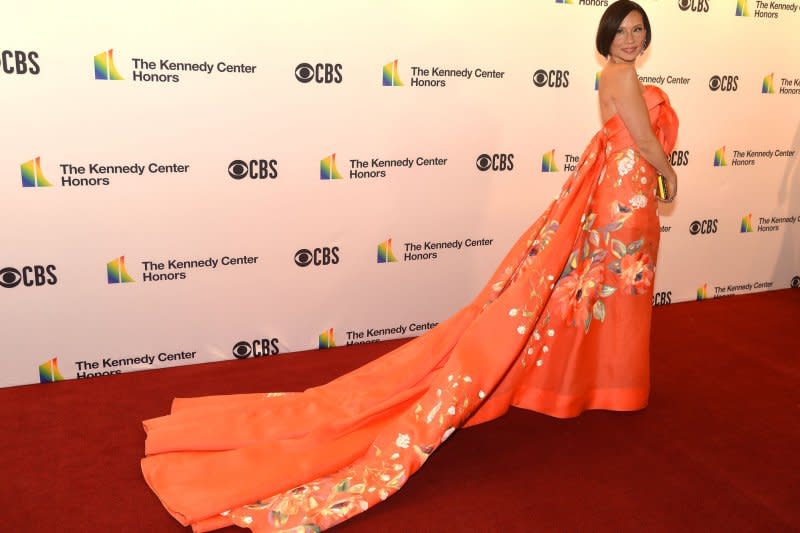 Lucy Liu poses for photographers on the red carpet as she arrives for a Kennedy Center gala performance in Washington in 2019. File Photo by Mike Theiler/UPI