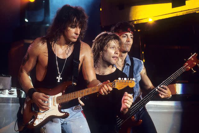 <p>Ke.Mazur/WireImage</p> Richie Sambora, Jon Bon Jovi and Alec John Such of Bon Jovi performing together