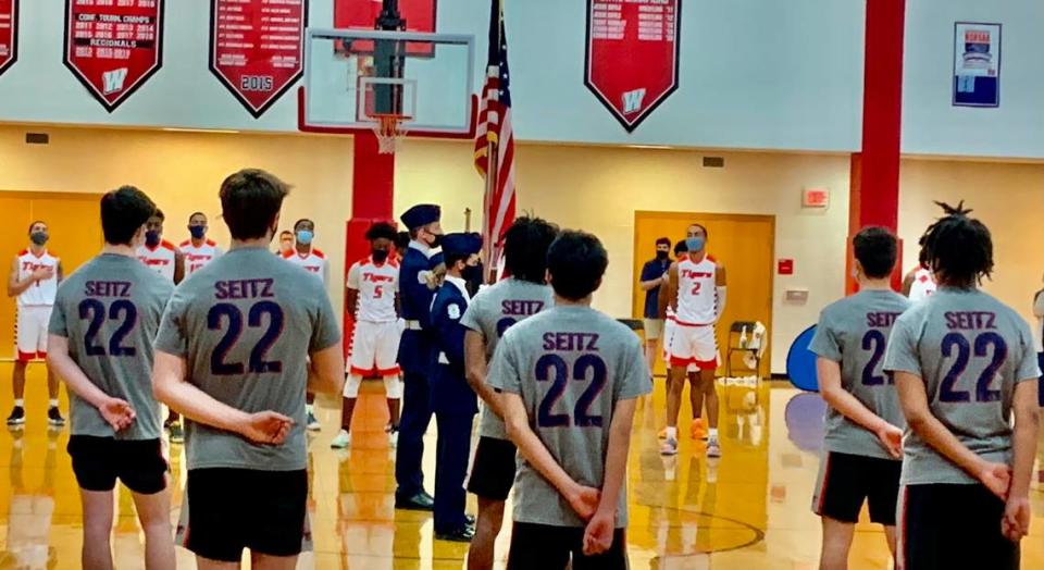 Lincoln Charter’s basketball players all wore “Seitz 22” shooting shirts before Saturday’s 1A men’s championship game between Lincoln Charter and Wilson Prep in Trinity, N.C. The shirts were in honor of Jamie Seitz, an assistant coach for the team who died from COVID on Dec. 27, 2020, and his son Carter Seitz, a senior for the team who also wears No. 22.