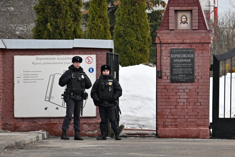 Russian police stand outside the Church of the Icon of the Mother of God ‘Quench My Sorrows’ in Maryino ahead of Navalny’s funeral on Friday (AP)