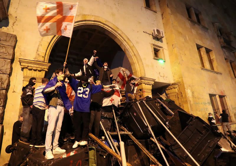 Demonstrators hold a rally to protest against a bill on "foreign agents", in Tbilisi