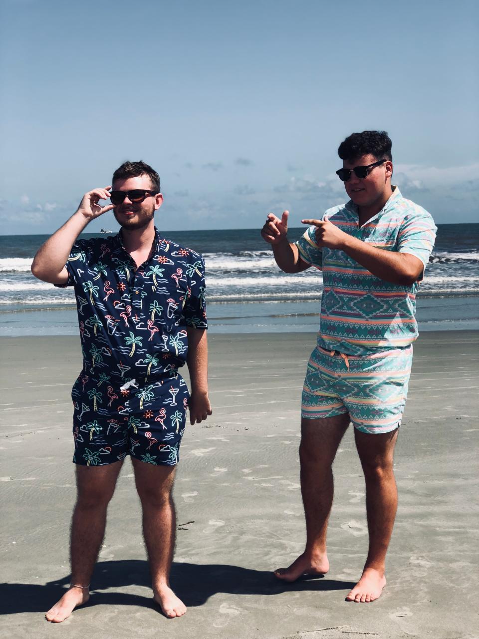 Nate Jones (right) and a friend have some fun while Nate models his swimwear.
