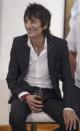 Rolling Stones guitarist Ronnie Wood smiles as he discusses his "Faces, Time and Places" gallery show in New York, April 9, 2012.