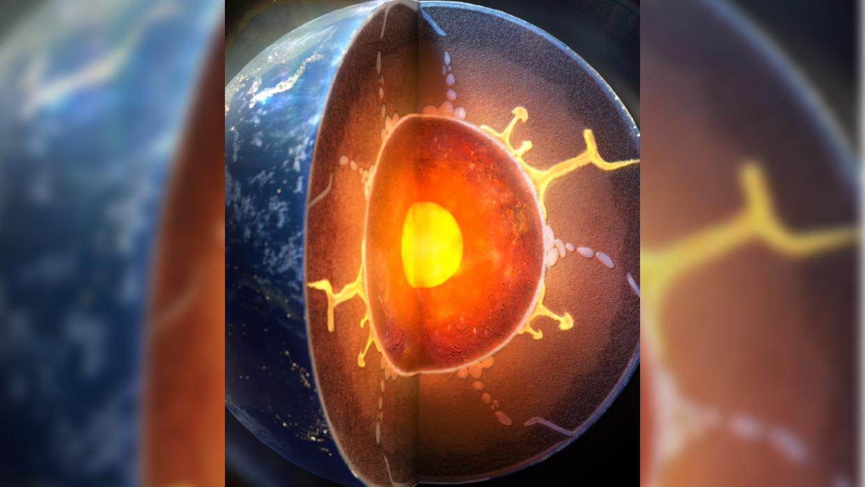 A diagram of Earth's interior with water leaking toward the core